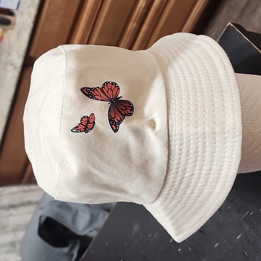 Beige butterfly bucket hat